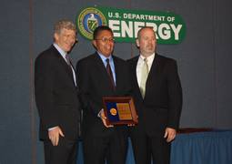 PECASE award winner Dr. Stanley Atcitty with Deputy Secretary Poneman and Jon Worthington, Deputy Assistant Secretary for Permitting, Siting and Analysis, Office of Electricity Delivery and Energy Reliability