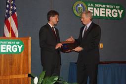 PECASE winner Dr. Jeffrey W. Banks receiving his award from Deputy Secretary of Energy Daniel B. Poneman