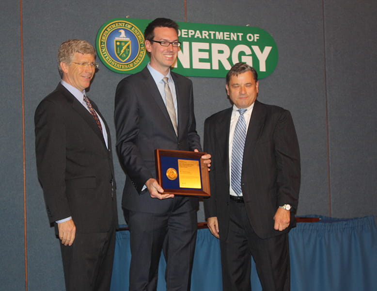 PECASE winner Derek Gaston with Deputy Secretary of Energy Daniel B. Poneman and Dennis Miotla, Deputy Assistant Secretary for Nuclear Power Deployment, Office of Nuclear Energy