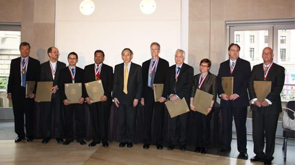Lawrence award winners posed with Energy Secretary Chu, holding their award certificates following the ceremony. From L to R: Riccardo Betti, University of Rochester, Paul C. Canfield, Ames Laboratory, David E. Chavez, LANL, Amit Goyal, ORNL, Secretary Chu, Energy Department, Mark B. Chadwick, LANL, Bernard Matthew Poelker, Thomas Jefferson National Accelerator Facility, Lois Curfman McInnes, Argonne, Barry F. Smith, Argonne, Thomas P. Guilderson, LLNL