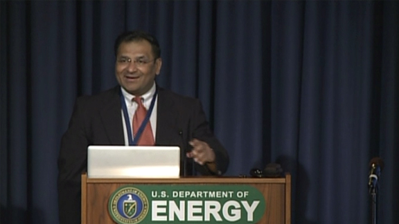Amit Goyal at the DOE podium delivering a presentation for the Science Lecture Series.