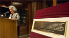 SLAC Director Persis Drell speaks during a special dinner at the Stanford Faculty Club on Friday. Also during the dinner, Barry C. Barish, past president of the American Physical Society and an emeritus physics professor at the California Institute of Technology, presented a plaque, pictured at right, on behalf of APS recognizing SLAC as a historic site for its many groundbreaking discoveries in science. (Photo by Matt Beardsley)