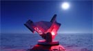 At the South Pole Telescope, scientists measure cosmic radiation still traveling across space from the early days of the universe.