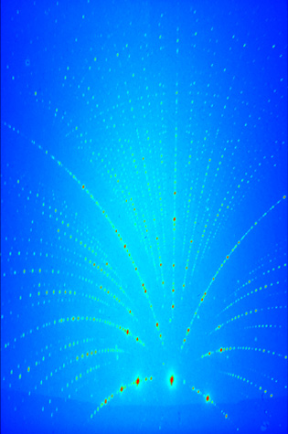 Image of tiny crystals used in warm-white LEDs.