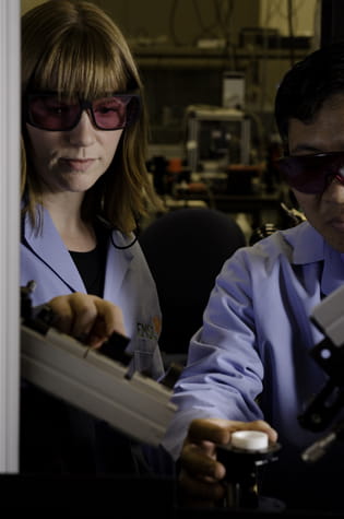 An photo of two scientists.