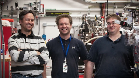 An picture of three scientists.