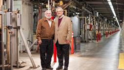 Claudio Pellegrini (right) and SLAC scientist Herman Winick in the klystron gallery of SLAC's linear accelerator. Pellegrini and Winick were instrumental in making the idea for LCLS a reality.