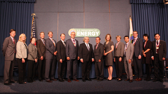 Lawrence award winners posed with Energy Secretary Moniz.