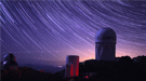 Star trails take shape around Kitt Peak National Observatory in this long-exposure.