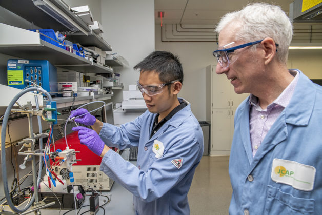 Berkeley Lab and Joint Center for Artificial Photosynthesis researchers Yanwei Lum (left) and Joel Ager have discovered that copper has potential as a catalyst for turning carbon dioxide into sustainable chemicals and fuels without any wasteful byproducts, creating a green alternative to present-day chemical manufacturing. (Credit: Marilyn Chung/Berkeley Lab)