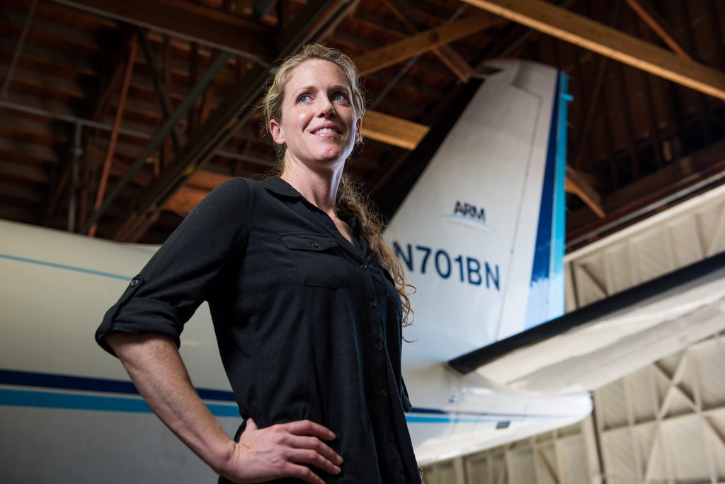 Jennifer Armstrong in front of the G-1 aircraft