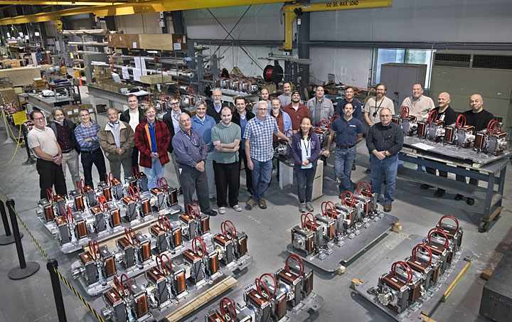 Members of the Brookhaven National Laboratory team with the completed magnet assemblies for the CBETA project.