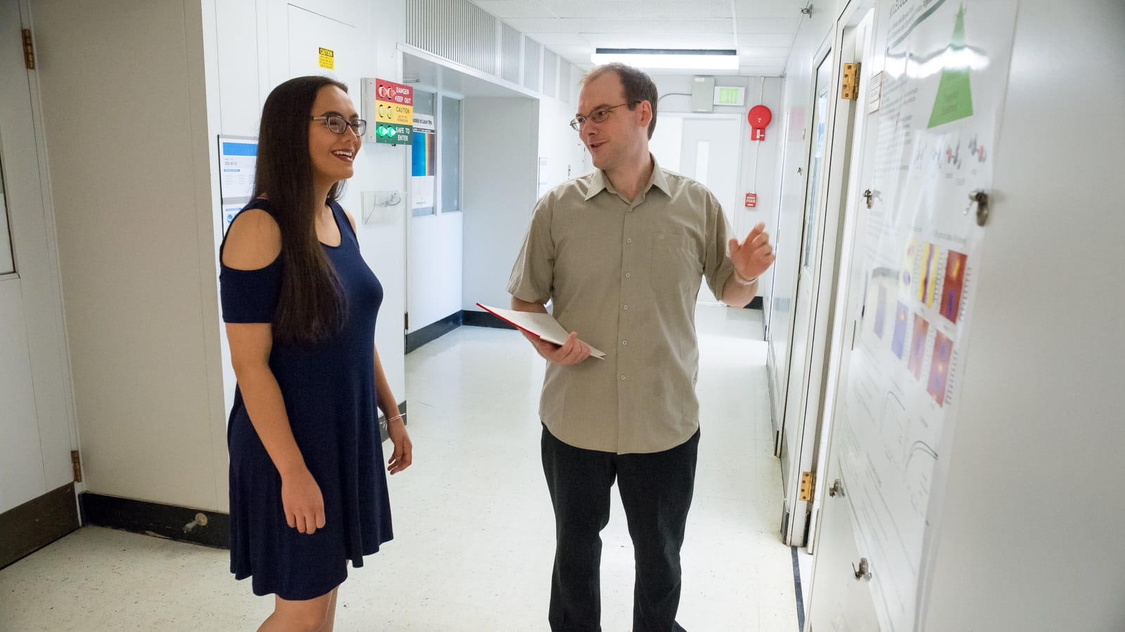 Argonne intern Savanna Dautle and chemist David Bross discuss research to develop more reliable computer models for gaseous systems. (Image by Argonne National Laboratory.)