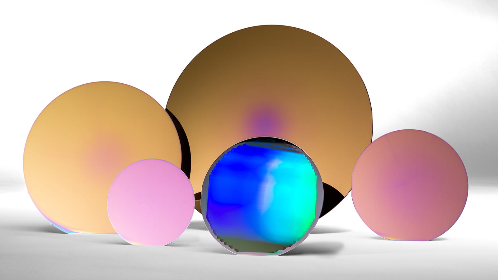 Silicon wafers, ranging in size from 4” to 12” diameter, which have been treated using Argonne’s sequential infiltration synthesis method.