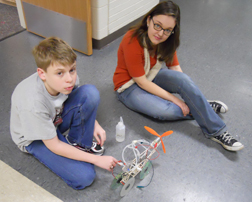 Joshua Nelson and Karin Bennett testing their fuel cell vehicle