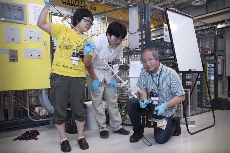 Three Japanese scientists in the lab