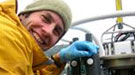 Postdoctoral student David Walsh preparing to deploy instrument to collect water samples