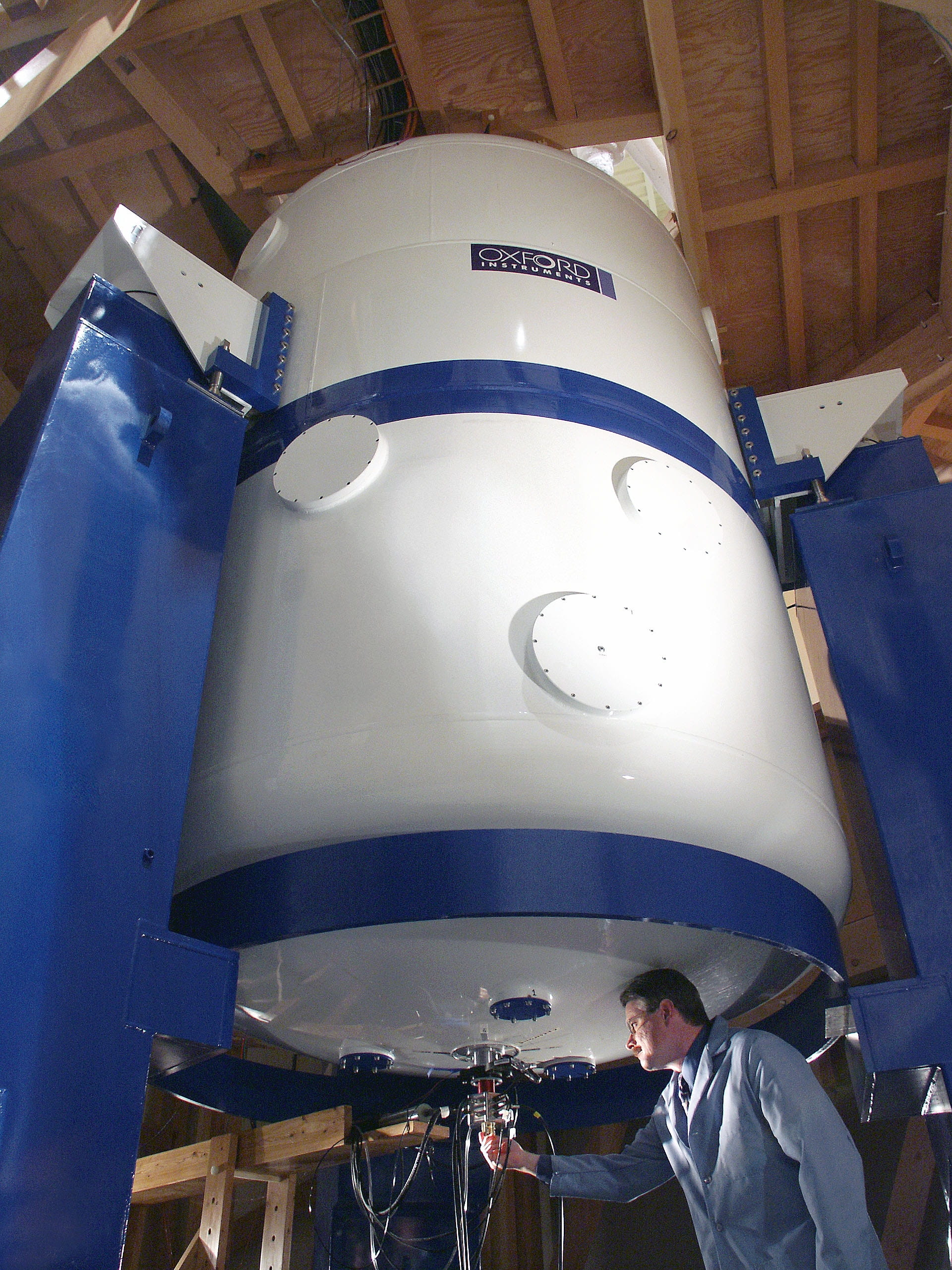 Two-story tank with a scientist underneath working