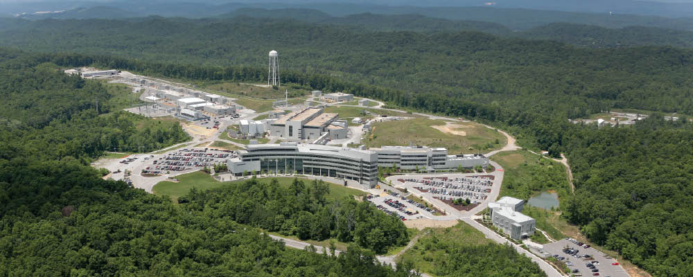 Aerial of the Spallation Neutron Source showing the Guest House, JINS, CLO, CNMS, and target building.