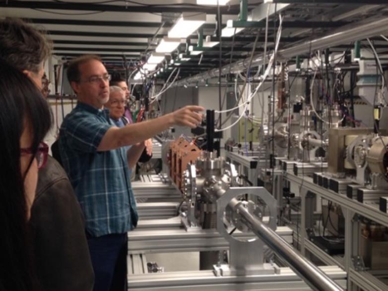 Interested visitors hear about the capabilities of the Argonne Wakefield Accelerator at Argonne National Laboratory’s recent open house