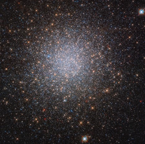 Hubble Space Telescope image of the globular cluster NGC 2419, a collection of stars orbiting the Milky Way about 300,000 light years away from Earth.